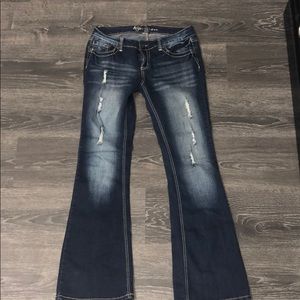 Boot cut distressed jeans